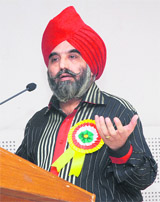 One of the poets at the Hasya kavi sammalen held at Indira Holiday Home in Chandigarh on Saturday.