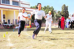 Differently-abled children participate in a race at the ongoing Special Olympics in Dehradun on Saturday.