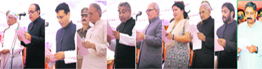 From left: Capt Ajay Singh Yadav, Randeep Singh Surjewala, Mahender Partap Singh, Om Parkash Jain, Paramvir Singh, Geeta Bhukkal, Shiv Charan Sharma, Gopal Kanda and Sukhbir Kataria take oath at Haryana Raj Bhawan in Chandigarh on Saturday.