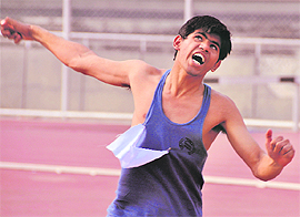 An athlete in action during the shot put event of the 56th Punjab School Games at Guru Nanak Stadium, Ludhiana, on Saturday. 