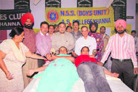 Students donate blood at A.S. College, Khanna, on Saturday.
