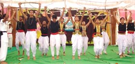 The students of JD School in village Dhora Mehrajpur perform a dance