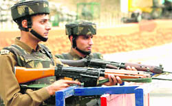 Security personnel keep vigil outside the Civil Secretariat in Jammu on Sunday.