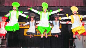 College boys perform bhangra at the Youth Festival in Amritsar