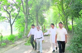 Residents inspect the renovation work at the Banasar Bagh in Sangrur