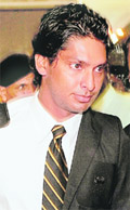 Sri Lankan cricket captain Kumar Sangakkara at Mumbai airport on Sunday. The Sri Lankan cricket team arrived in the city for a seven-week tour of India.