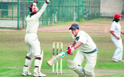 A match between UP and Gujarat in progress at DAV Senior Secondary School, Sector 8, in Chandigarh on Monday.