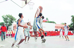 The semifinal between Doon International and Summer Valley in progress in the Under-16 District Basketball Championship at Doon International in Dehradun