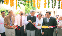 Principal Secretary (Health) Keshav Desi Raju inaugurates a Jan Aushdhi store at 