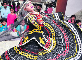 A Rajasthani dancer performs at a children’s workshop organised in Ludhiana on Monday.