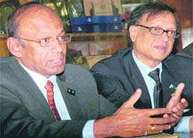 Dr Arun Chockalingam (left), faculty of health sciences at Simon Fraser University, and Dr Arun Garg, medical director, department of pathology at Royal Columbian Hospital, at PGI