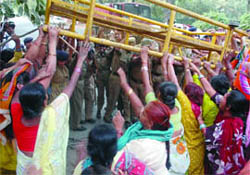 BJP Mahila Morcha activists protest against the parole of Manu Sharma outside the Chief Ministers residence in New Delhi on Tuesday.