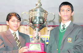 Sneha Deoli and Saravjeet Singh with the trophy of a debate competition held at Bala Hissar School in Dehradun on Tuesday.