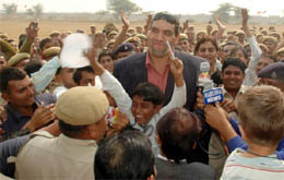 Khali interacts with children at IRB Headquarters-cum-Recruits Training Centre at Bhondsi in Gurgaon on Tuesday.