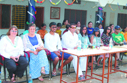 Teachers from the UK, family members of D.D. Ahir and school authorities during a function