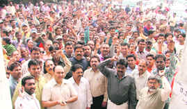 The MC Karamchari Dal members hold a protest in Ludhiana on Tuesday. 