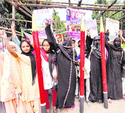 Girls take out a rally to increase awareness of education among Muslims, in Patna on Tuesday.