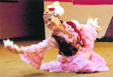An artiste performs during the National Education Day at DAV College, Sector 10, in Chandigarh on Wednesday.