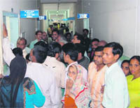 A crowd of patients at a hospital in Dehradun