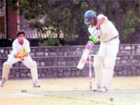 A match in the Council School Cricket Tournament in progress at Dehradun 