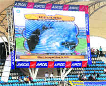 A satellite image of cyclone Phyan is shown on a giant screen at the DY Patil stadium in Mumbai on Wednesday.