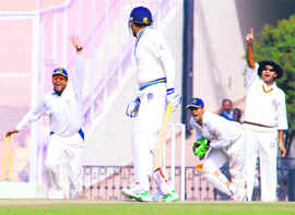 VVS Laxman has a close shave against Punjab at the PCA stadium in Mohali on Wednesday.