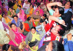 Aanganwari workers from Punjab protest outside the social welfare department in Chandigarh 