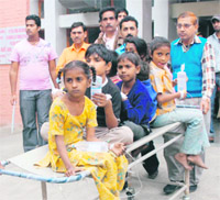 Schoolchildren at a trauma centre in Karnal on Thursday.