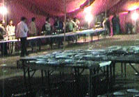 Broken plates lie scattered at the dinner venue in Nawanshahr