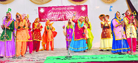 Students perform a dance at Doraha Institute of Management and Technology on Thursday.