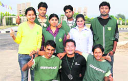 Greenpeace volunteers motivate people to care for the planet