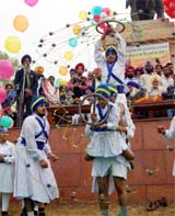 Students perform gatka during the birth anniversary celebrations of Maharaja Ranjit Singh at Ram Bagh 