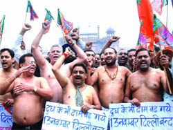 BJP activists hold a 'half naked march' at the Red Fort on Friday.