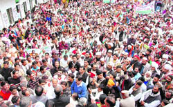 Congress workers at a rally against the state government in Dehradun on Friday.