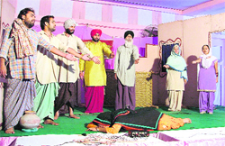 Theatre artistes perform during a function organised by the social security department in Ludhiana 