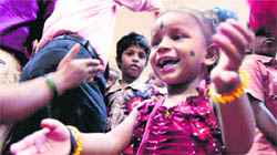 Children below 14 years, who underwent heart surgeries, participate in a cultural programme held on the eve of Childrens day, in Chennai on Friday.
