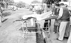 Family members of a patient face difficulty transfering him to the General Hospital, Sector 6, due to VIP security following the Haryana Chief Ministers visit, in Panchkula