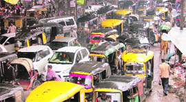 Autorickshaws create traffic chaos near Clock Tower in Ludhiana on Saturday.