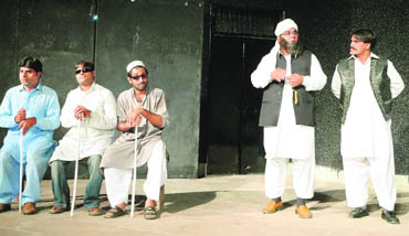 Pakistani artistes performing in a political spoof, Akhian Waleo