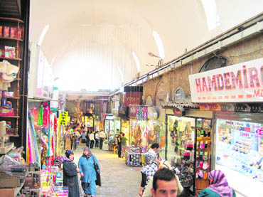 The aroma of saffron, stuffed apricots, nuts and myriad other spices wafts through Istanbuls spice market 