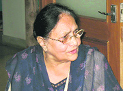 The victim, Rajinder Ahluwalia, addresses the media at her house in Chandigarh on Sunday. 