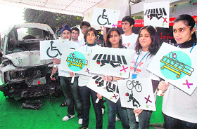 Students display illustrations during the road safety exhibition held at Sukhna Lake in Chandigarh on Sunday. 