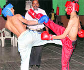 Players in action at the National Kickboxing Championship in Dehradun on Sunday