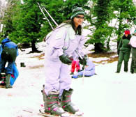Tourists enjoy fresh spell of snowfall at Gulaba, 19 km from Manali, on the Manali-Rohtang Pass road on Sunday
