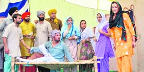 Artistes stage a play, “Mitti Rudan Kare”, at Sherpur Kalan, Jagraon