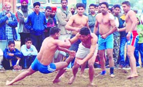 Kabbadi players in action during the rural sports festival at Sarabha village