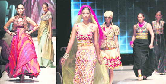 Models wear creations by Tarun Tahiliani and Malini Ramani during Jakarta Fashion Week.