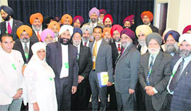 The religious representative of US President Barack Obama, Paul Monteiro (centre), with Sikh leaders from all over America in the White House in Washington DC to participate in a function organised to mark the birth anniversary of Guru Nanak Dev. 