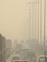 Fog covers the Delhi-Jaipur highway (NH-8) in Gurgaon on Monday