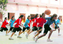 A match in progress at the Inter-School Council School Junior Girls Basketball Tournament in Dehradun on Monday
